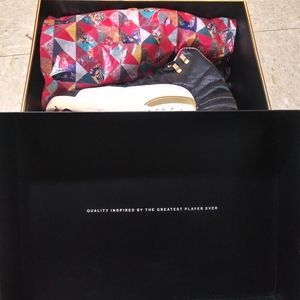 Air Jordan Retro 12s "Chinese New Year". Black/True Red-Sail. W/ Original box.
